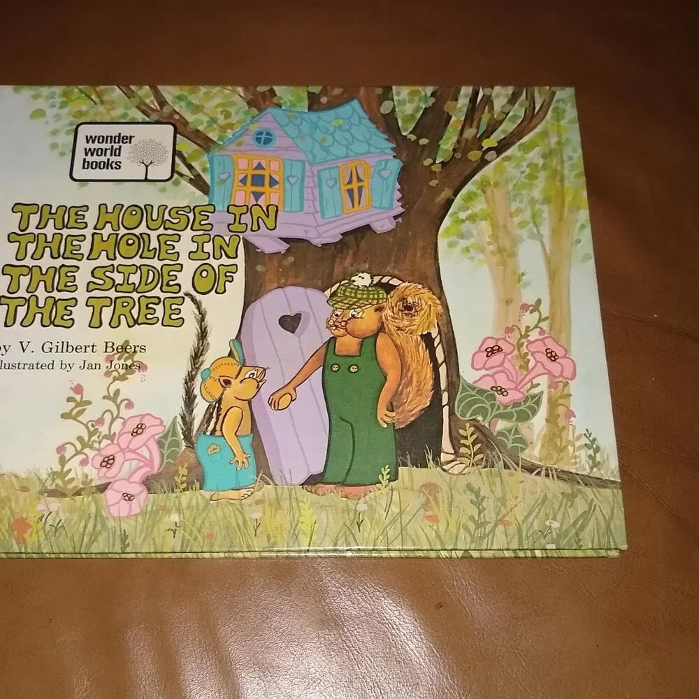 Beany and Scamp by Bassett + House in the hole in the side of the tree by Beers